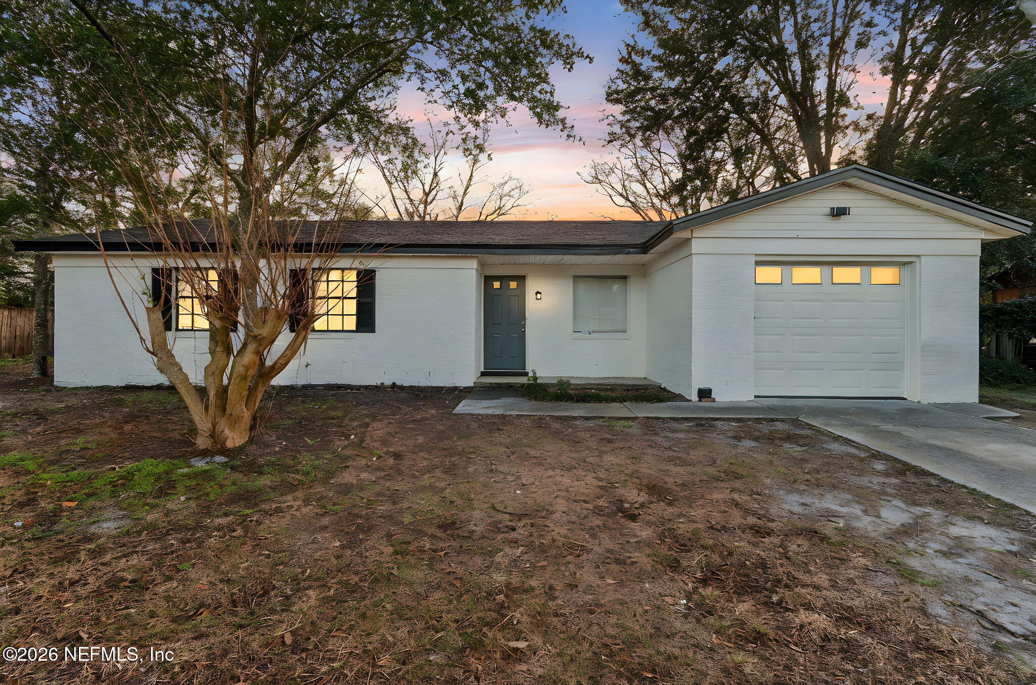 8234 Frost Street South Jacksonville, FL 32221 - Photo 2 of 65 a view of a house with a outdoor space