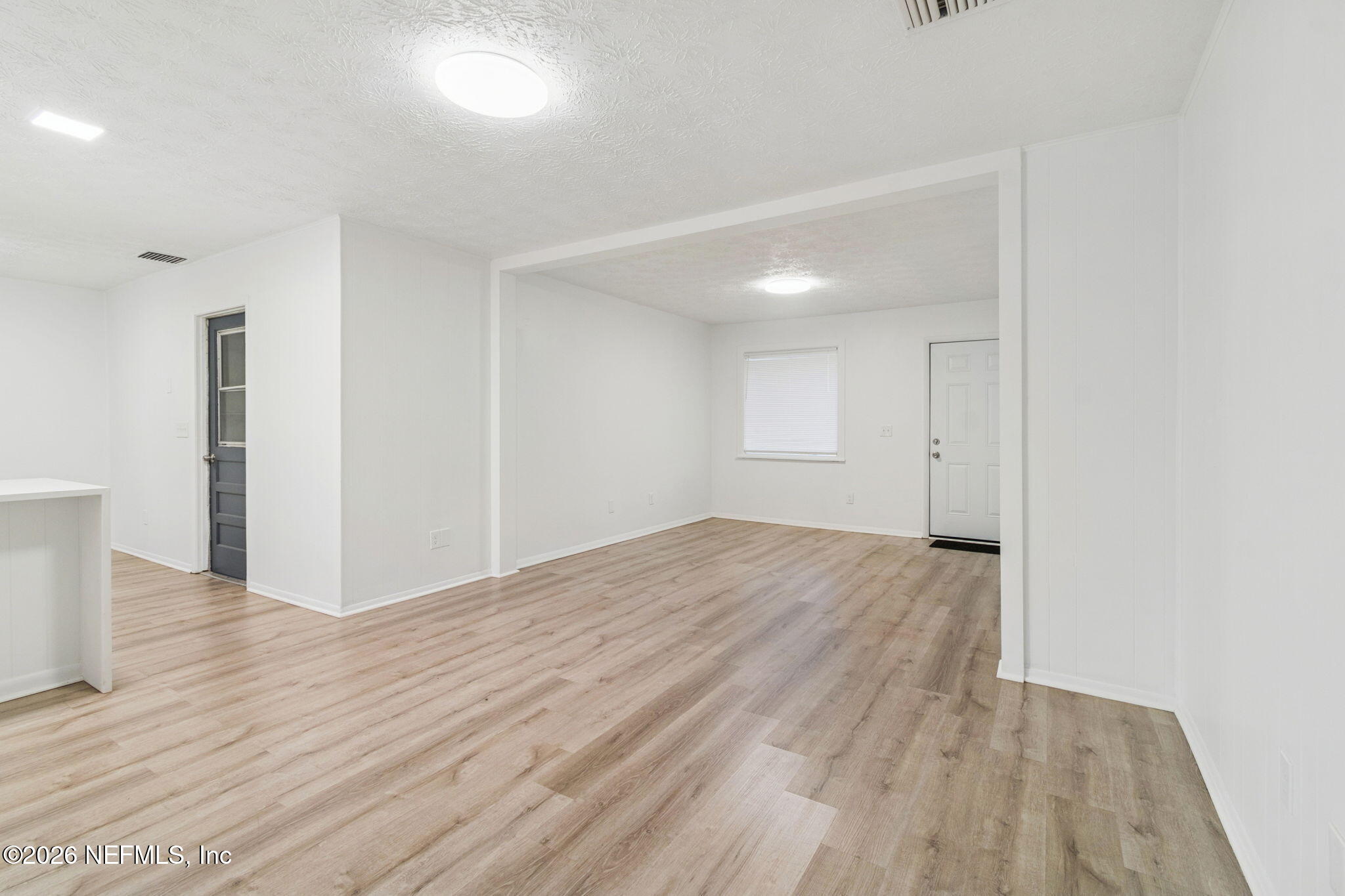 8234 Frost Street South Jacksonville, FL 32221 - Photo 21 of 65 a view of empty room with wooden floor
