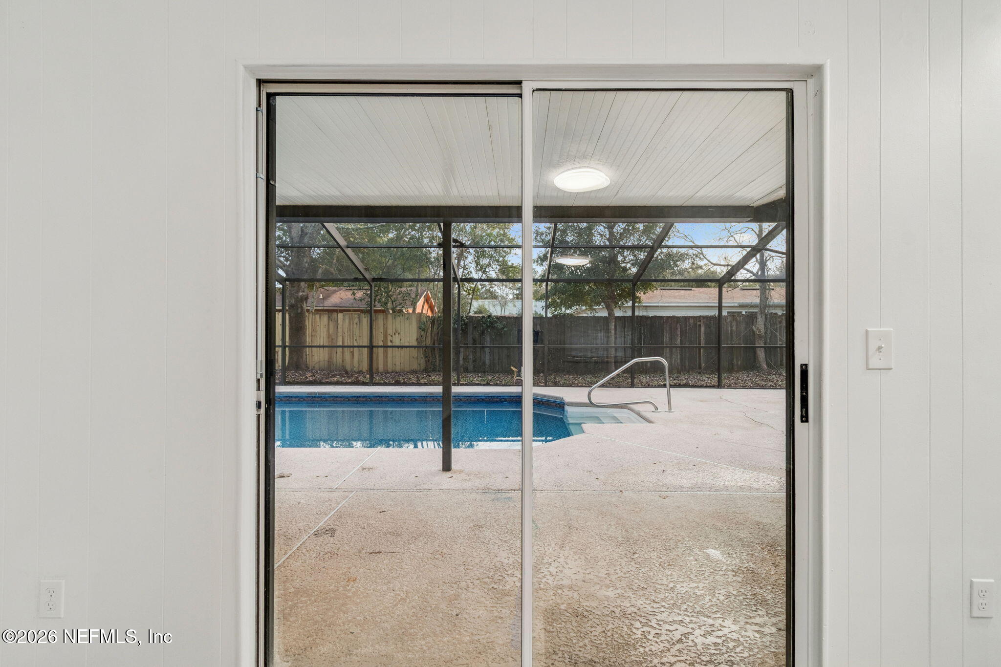 8234 Frost Street South Jacksonville, FL 32221 - Photo 40 of 65 a view of a glass door with a glass door