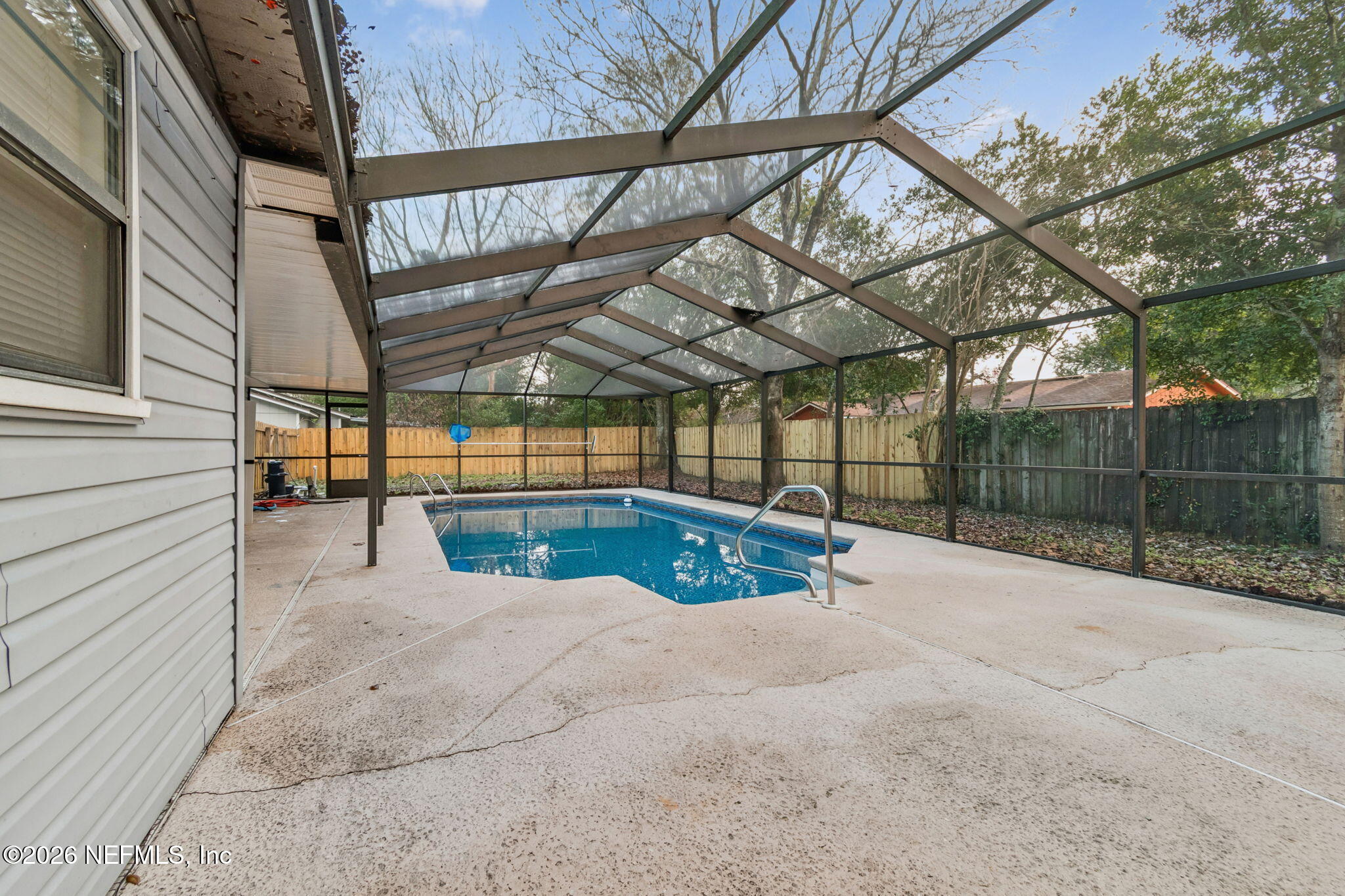 8234 Frost Street South Jacksonville, FL 32221 - Photo 49 of 65 a view of backyard with a small cabin