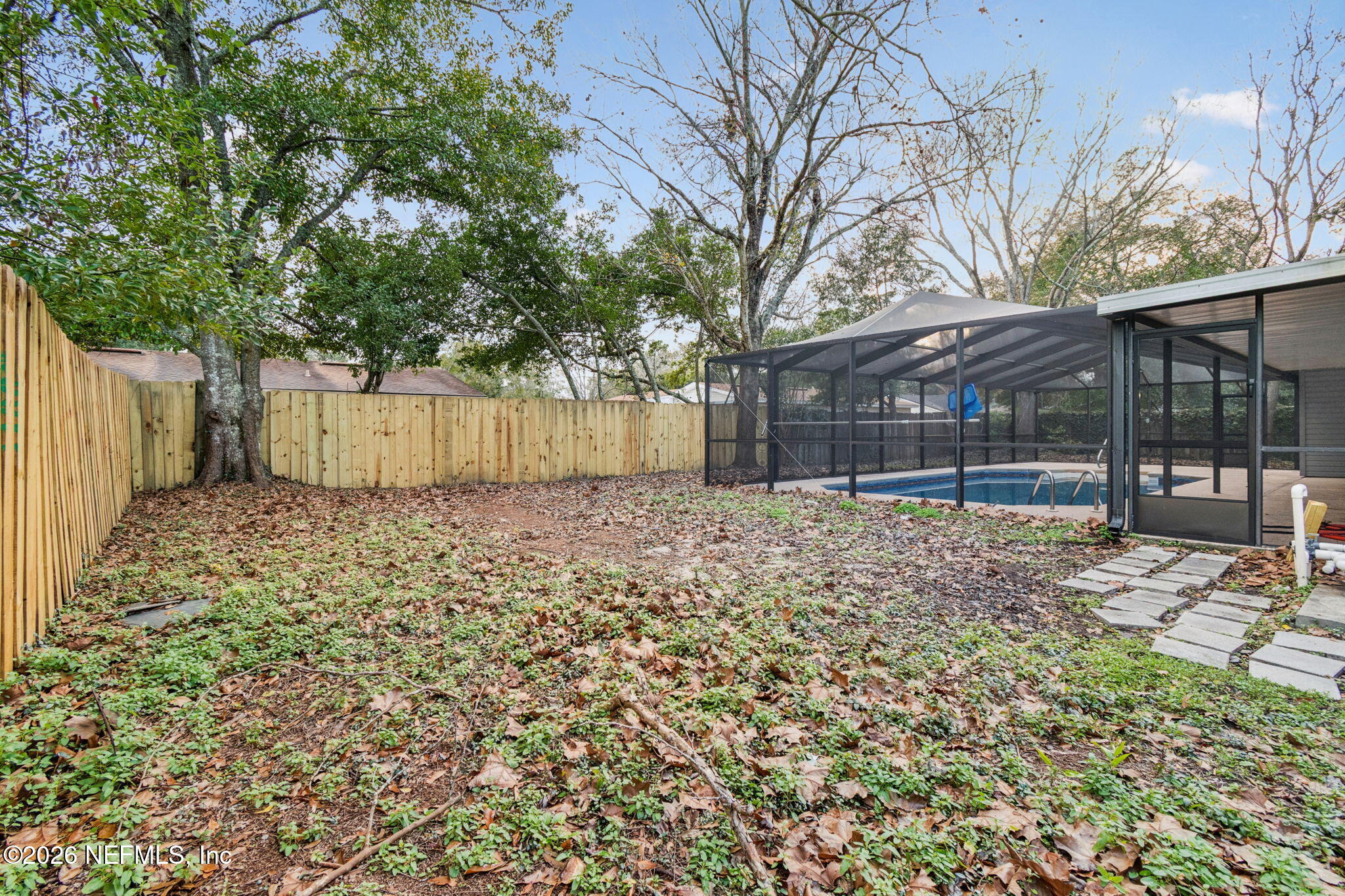 8234 Frost Street South Jacksonville, FL 32221 - Photo 53 of 65 a backyard of a house