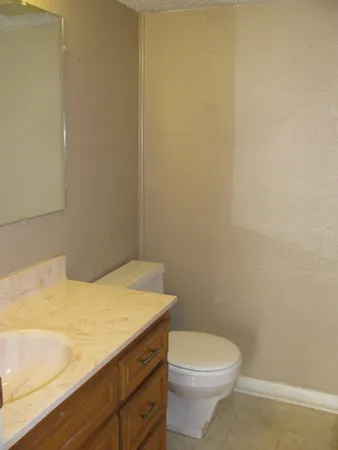 a bathroom with a sink and a toilet