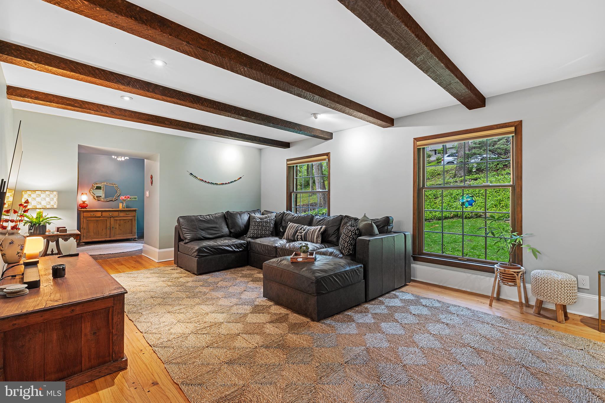 290 Danell Road Wayne, PA 19087 - Photo 4 of 42 living room with wood beams, beautiful fireplace