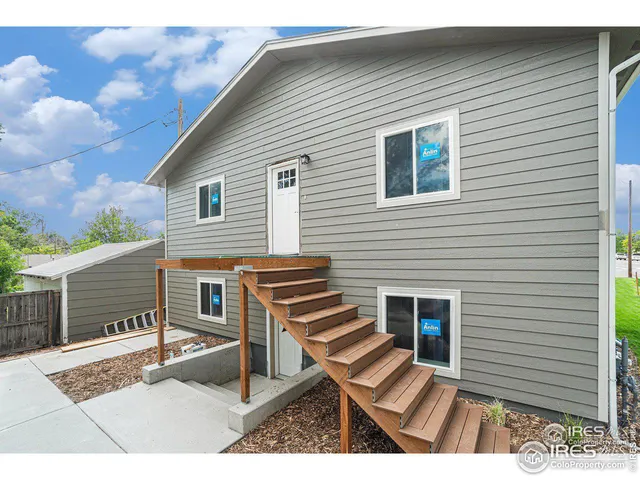 a view of a house with a white door
