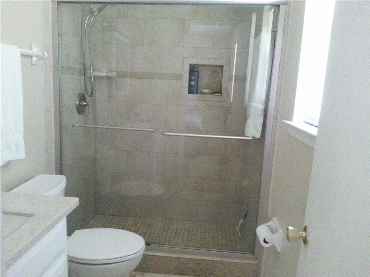 485 Quigley Road Pensacola, FL 32506 - Photo 15 of 20 Beautiful tile shower wth glass door