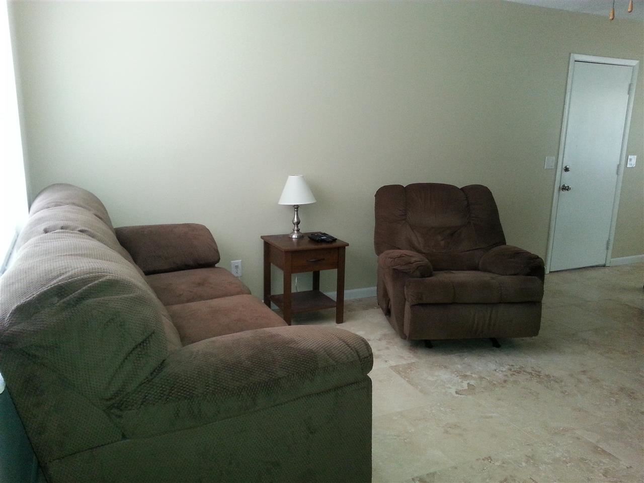 485 Quigley Road Pensacola, FL 32506 - Photo 2 of 20 Lots of ambient lighting, Travertine tile flooring