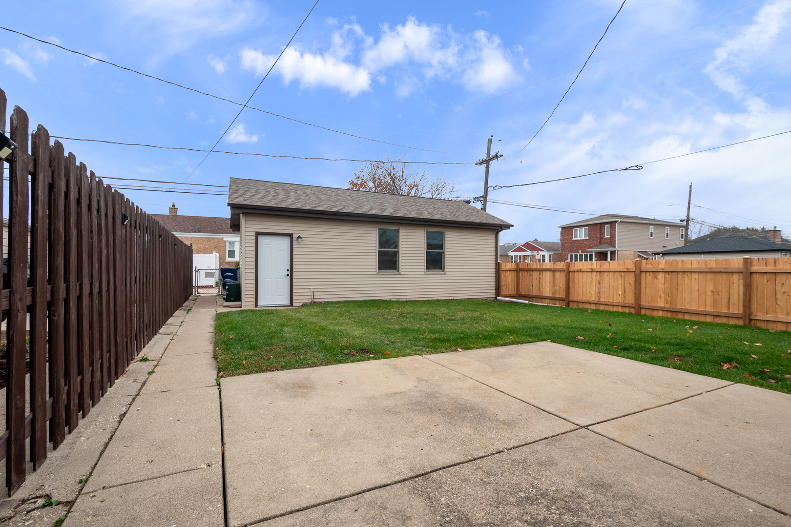 4701 Thatcher Avenue Norridge, IL 60706 - Photo 18 of 23 a view of a backyard with plants and a garage