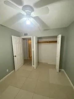an empty room with a bathroom
