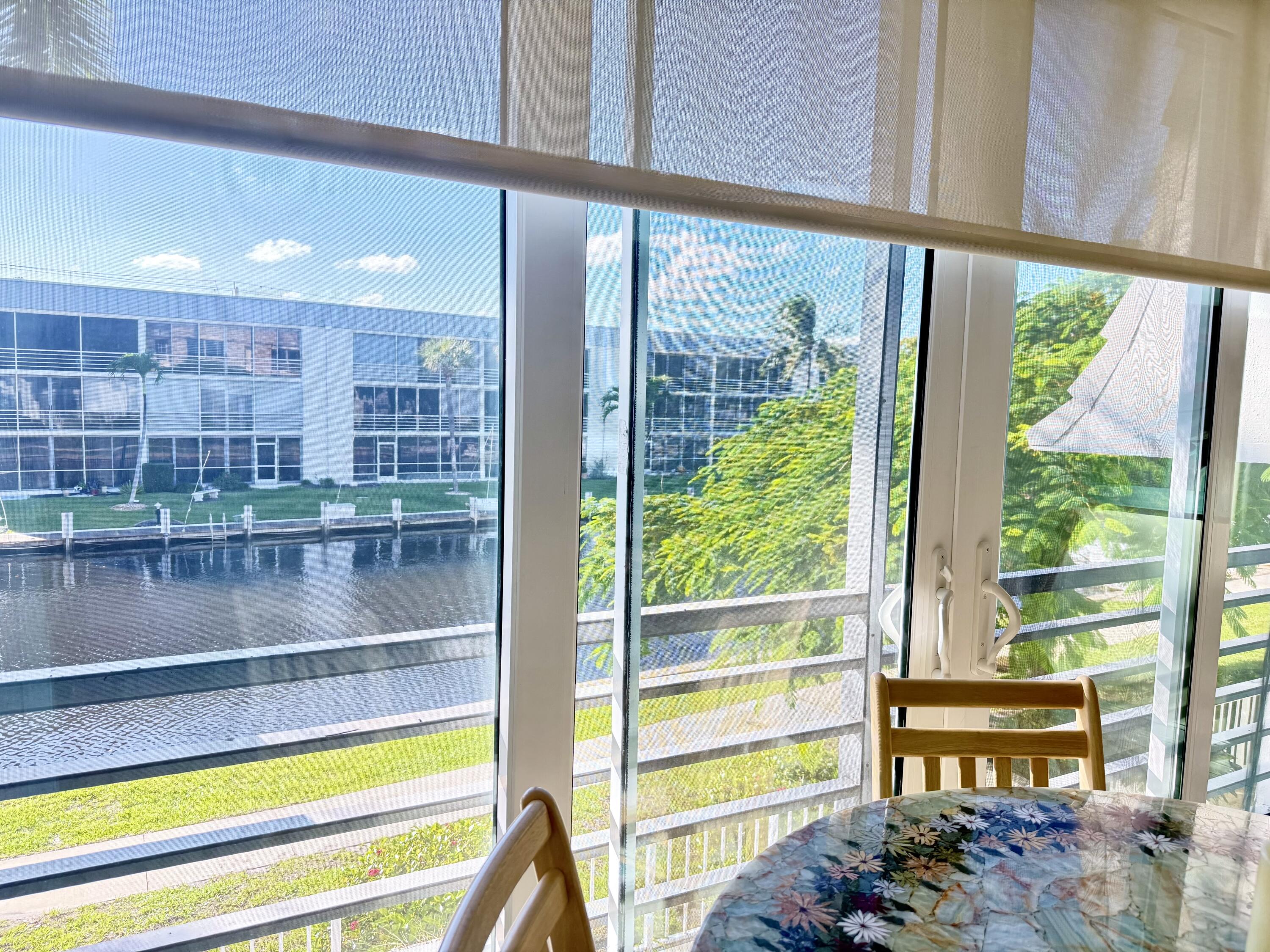 765 Jeffery Street, Unit 1203 Boca Raton, FL 33487 - Photo 14 of 31 Sliders & Screens on Enclosed Balcony