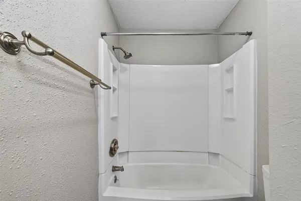a close view of a bathtub in bathroom