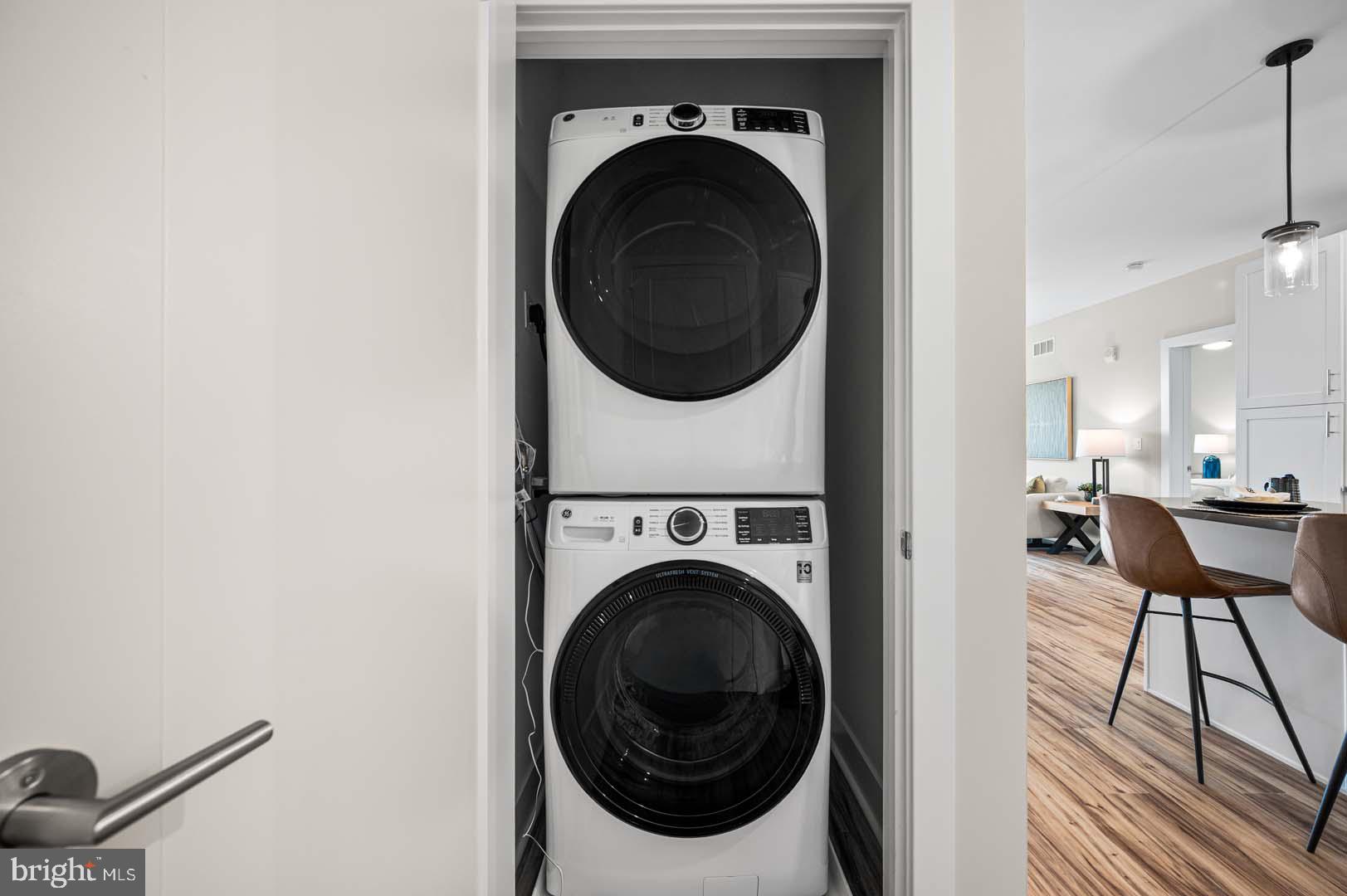 703 Rice Boulevard, Unit 103 Exton, PA 19341 - Photo 10 of 10 Efficient laundry setup in modern design.