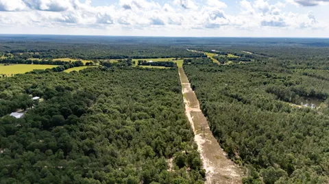 a view of a city with an ocean