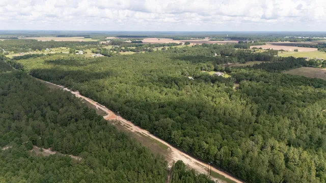 a view of an ocean and a yard