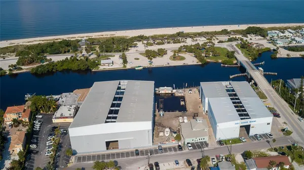 an aerial view of house with yard