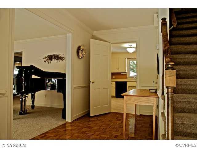 10800 Shingle Oak Road Chester, VA 23831 - Photo 5 of 11 a balcony view with a table and chairs