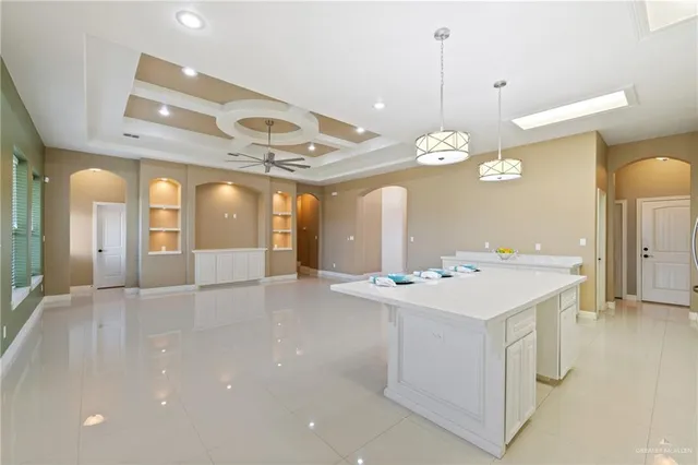 a view of a sink and a chandelier