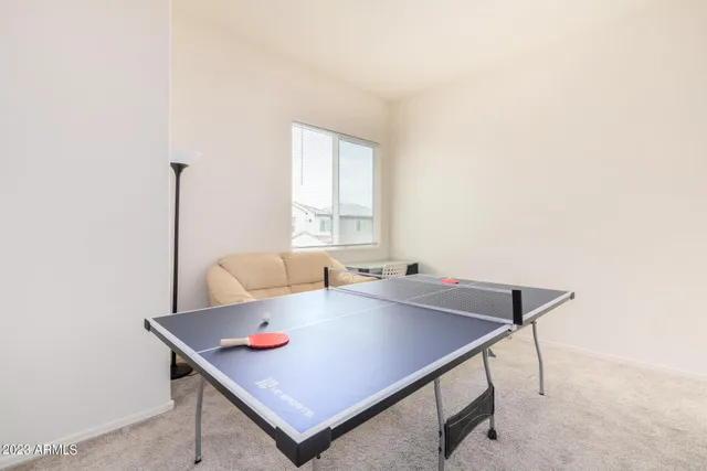 a workspace with furniture and window