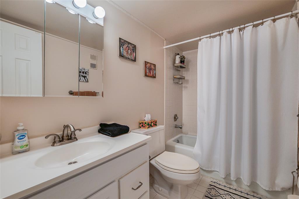 3930 Inverrary Boulevard, Unit 407D Lauderhill, FL 33319 - Photo 26 of 60 a bathroom with a sink toilet and shower