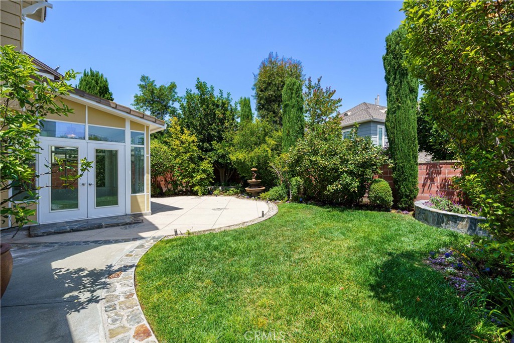 15 Plum Street Ladera Ranch, CA 92694 - Photo 64 of 113 a view of a house with a yard and tree s