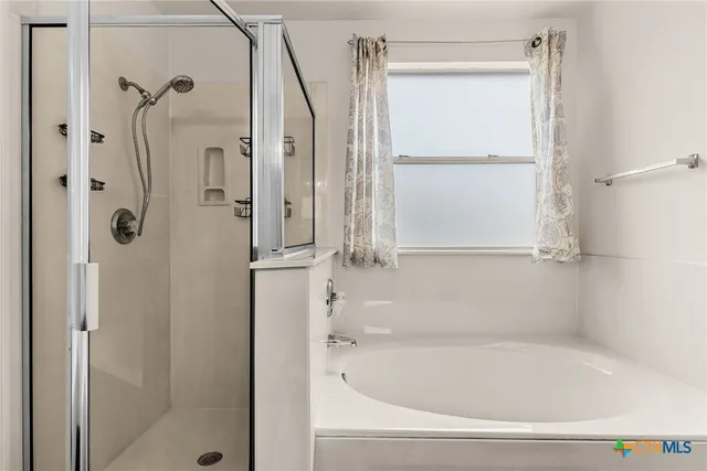 a bathroom with a bathtub