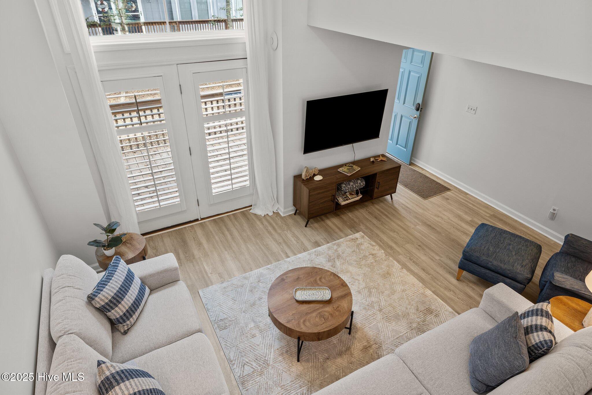 651 Salter Path Road, Unit 20B Pine Knoll Shores, NC 28512 - Photo 13 of 41 Dining Area Overlooks Living Room