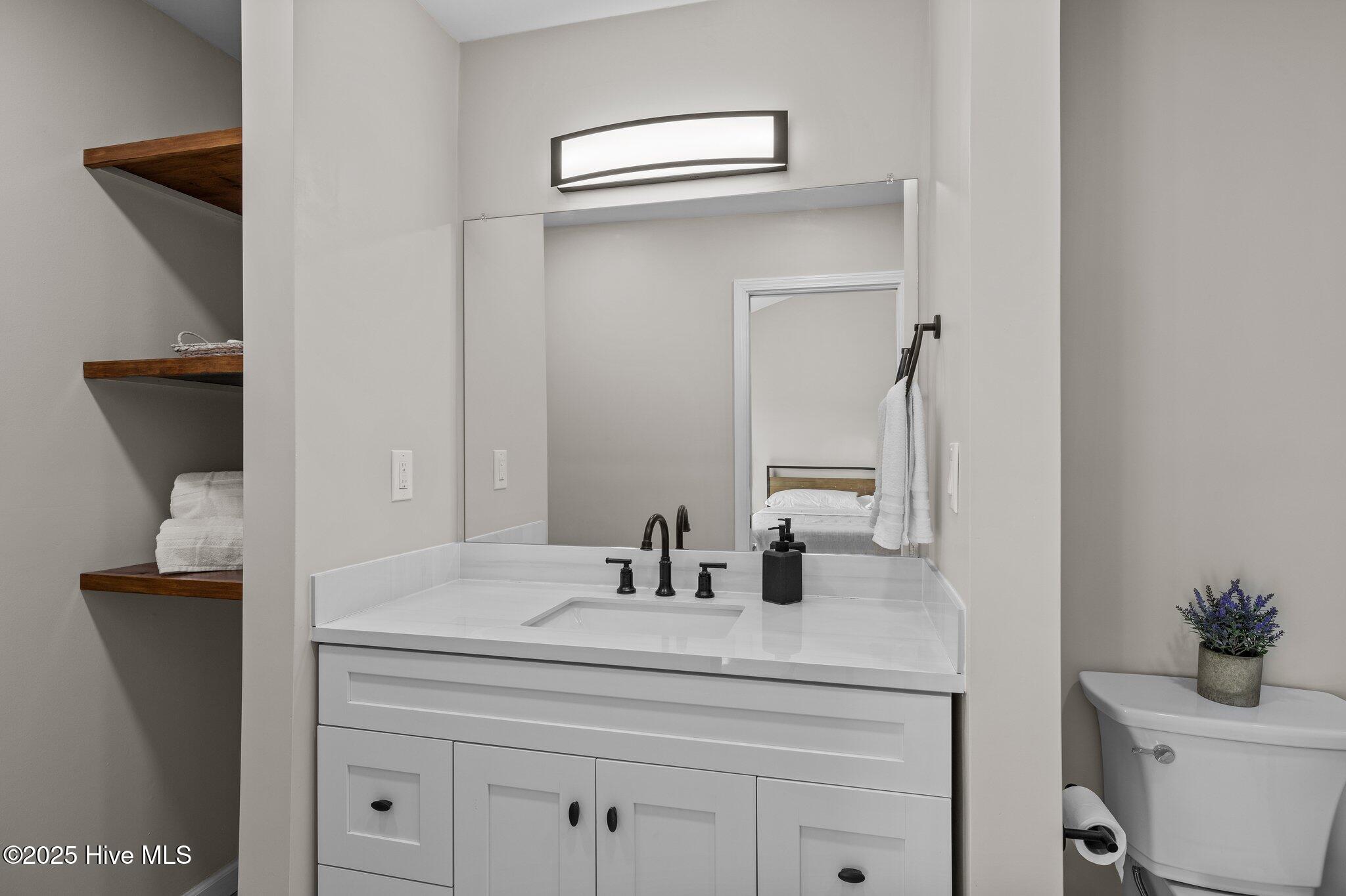 651 Salter Path Road, Unit 20B Pine Knoll Shores, NC 28512 - Photo 17 of 41 En-Suite Primary Bathroom