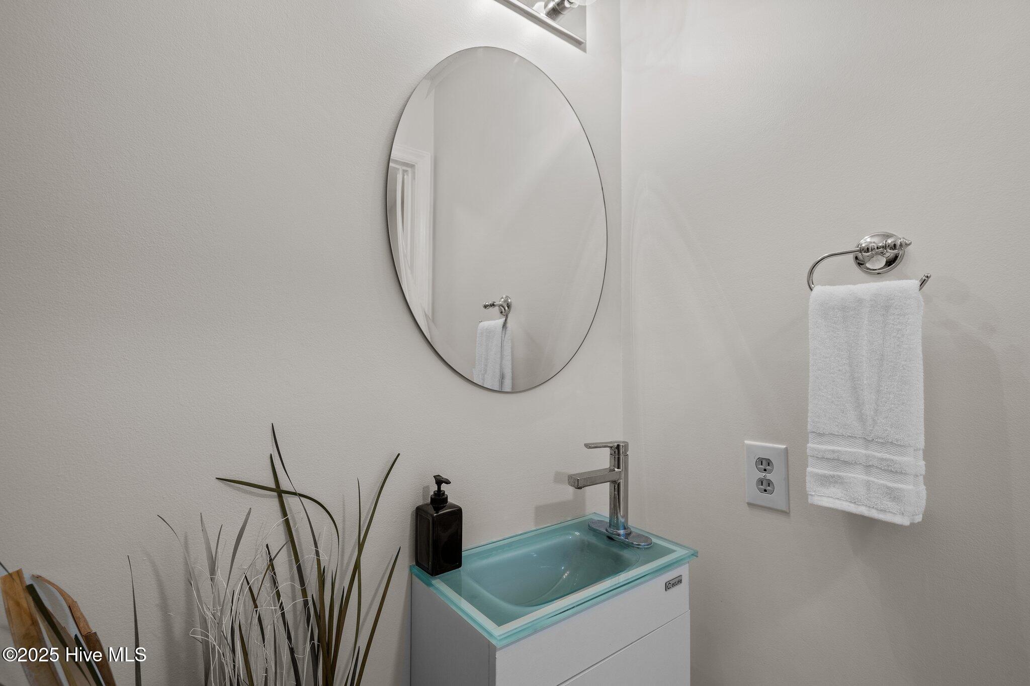 651 Salter Path Road, Unit 20B Pine Knoll Shores, NC 28512 - Photo 26 of 41 Powder Room Off Kitchen