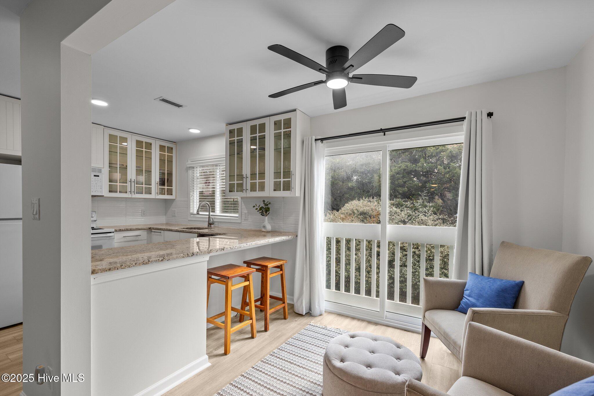 651 Salter Path Road, Unit 20B Pine Knoll Shores, NC 28512 - Photo 8 of 41 Kitchen & Sitting Area