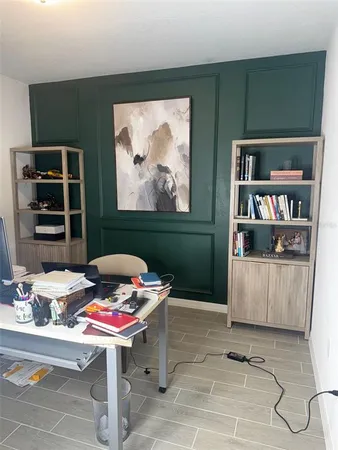 a room with furniture and window