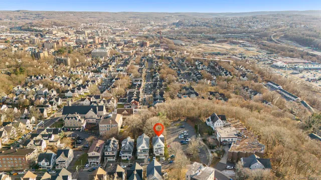 an aerial view of residential building and parking space