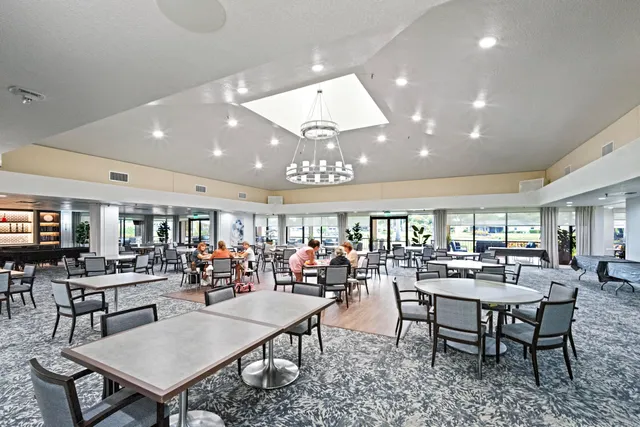a view of a a dining room with furniture
