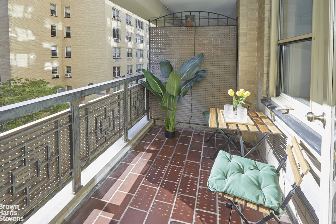 415 East 52nd Street, Unit 6GC Manhattan, NY 10022 - Photo 6 of 15 a view of balcony with potted plants