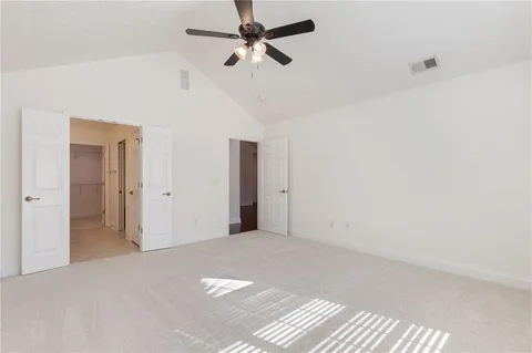 a bathroom with a sink double vanity and a mirror
