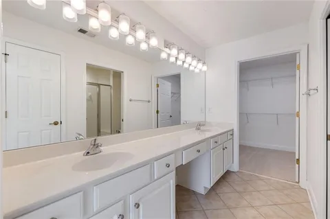 a bathroom with a shower and toilet