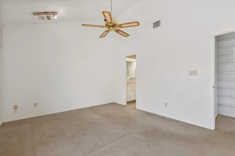 a bathroom with a shower sink and mirror
