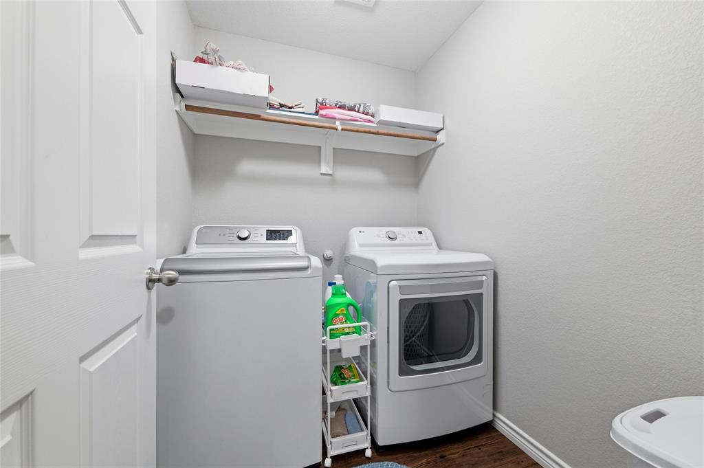 300 West Main Street Itasca, TX 76055 - Photo 18 of 31 a utility room with dryer and washer