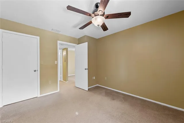 a view of storage and utility room with washer and dryer