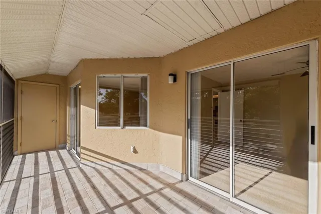 a view of yard with swimming pool and green space