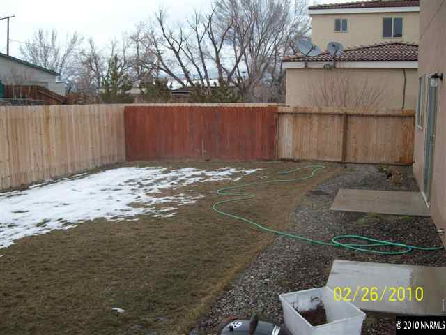 9815 Meadowstar Drive Reno, NV 89506 - Photo 8 of 9 a view of a backyard of the house