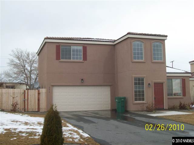 9815 Meadowstar Drive Reno, NV 89506 - Photo 9 of 9 a front view of a house with a garage