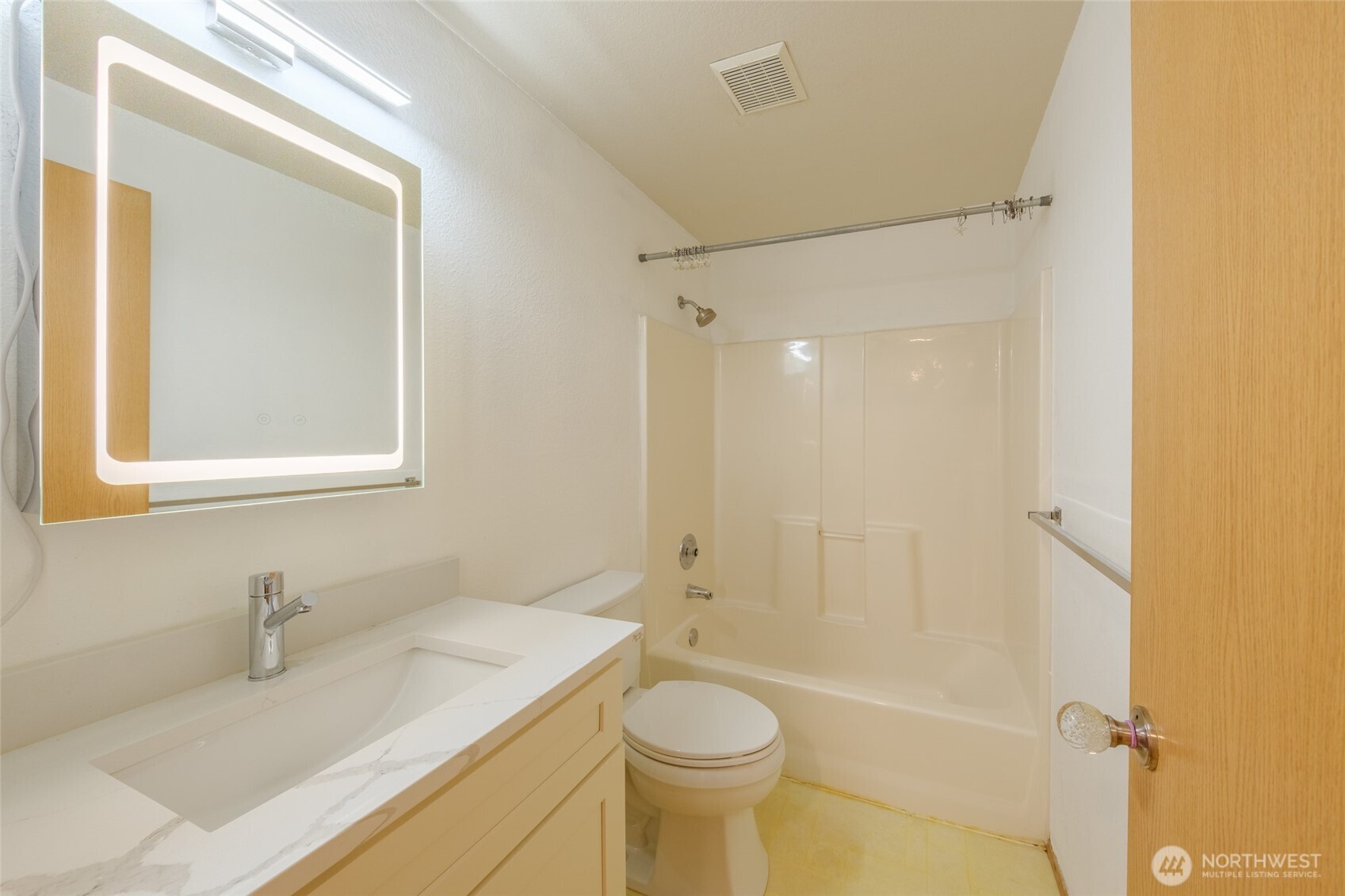 830 234th Street Southeast Bothell, WA 98021 - Photo 15 of 26 a bathroom with a granite countertop sink toilet and shower
