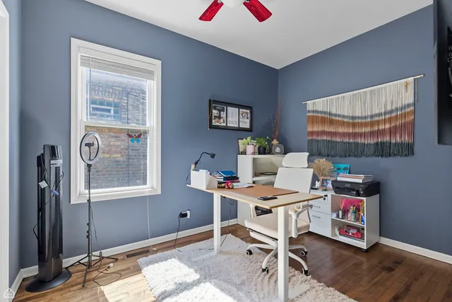 a workspace with furniture and window