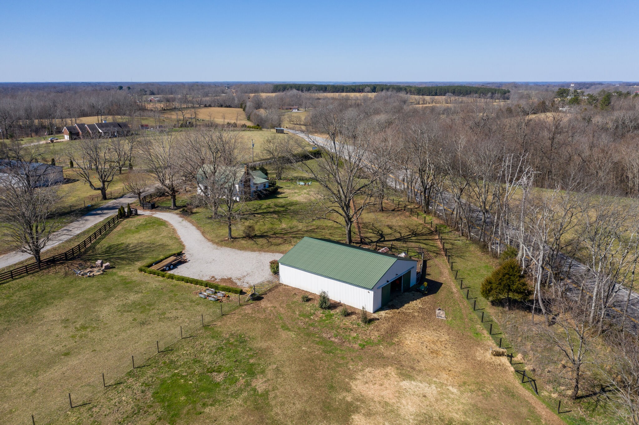 502 Fire Tower Road Pulaski, TN 38478 - Photo 8 of 48 an aerial view of a house with a yard and lake view