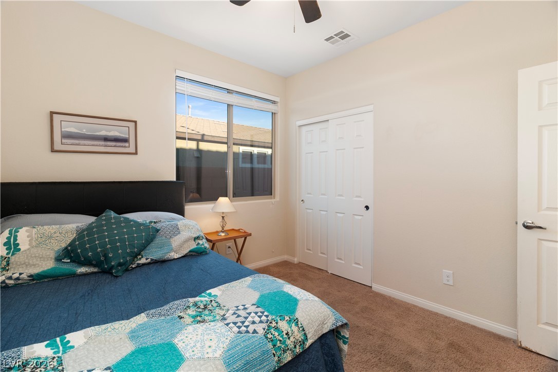 2079 Port Royal Drive Laughlin, NV 89029 - Photo 41 of 86 Third Bedroom with carpet, a closet, and a ceiling fan