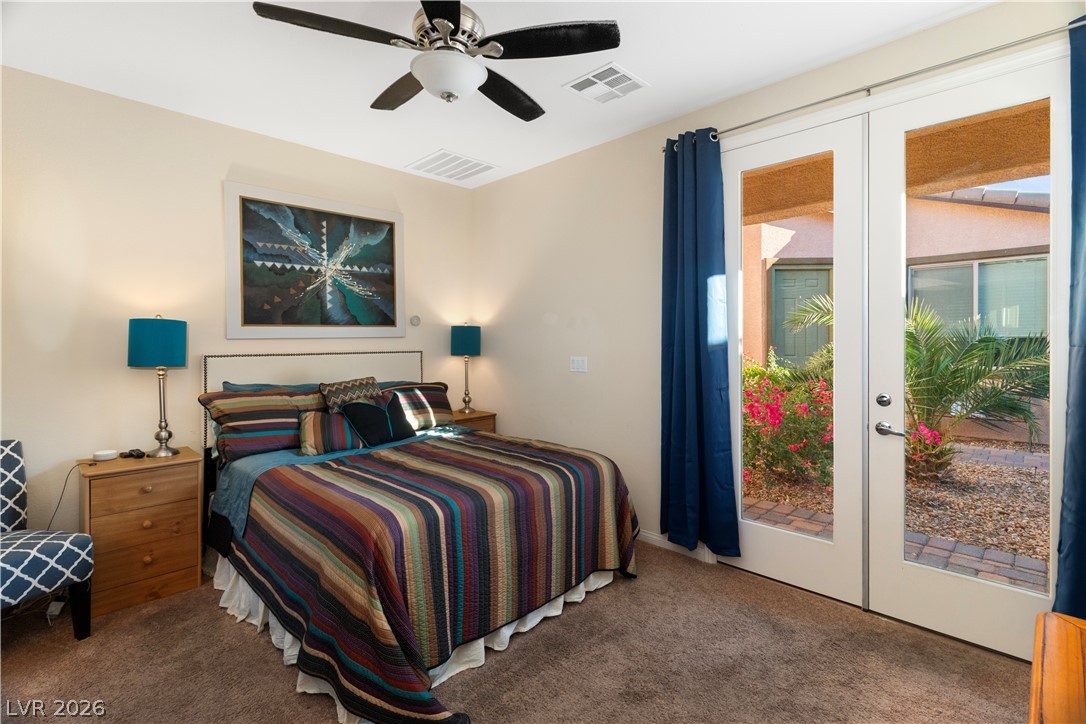 2079 Port Royal Drive Laughlin, NV 89029 - Photo 44 of 86 Carpeted bedroom in Casita / private guest quarters with access to outside, french doors, and a ceiling fan