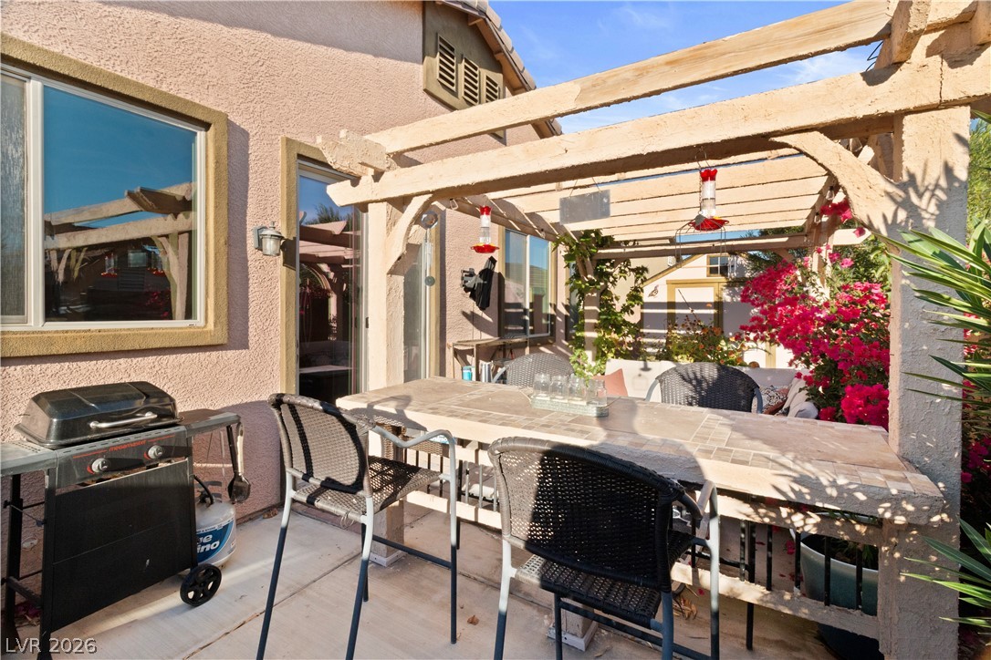 2079 Port Royal Drive Laughlin, NV 89029 - Photo 54 of 86 View of patio / terrace with outdoor dining area, a pergola, and area for grilling