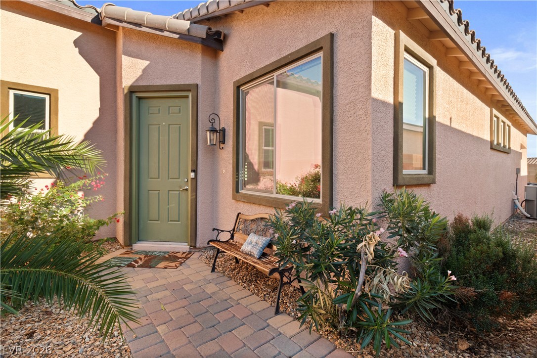 2079 Port Royal Drive Laughlin, NV 89029 - Photo 6 of 86 Doorway to property featuring a tiled roof and stucco siding