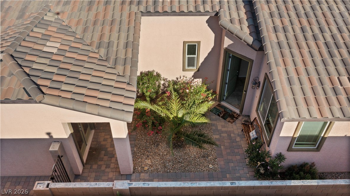 2079 Port Royal Drive Laughlin, NV 89029 - Photo 76 of 86 View of home's exterior with a tiled roof and stucco siding