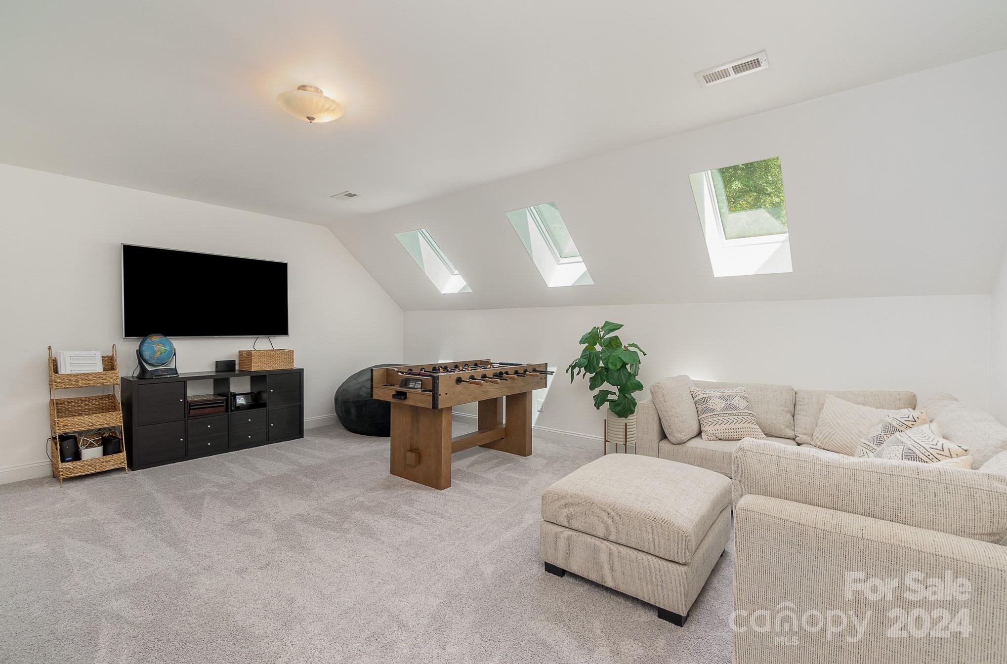 2070 Applebrook Drive Monroe, NC 28110 - Photo 17 of 35 a living room with furniture and a flat screen tv