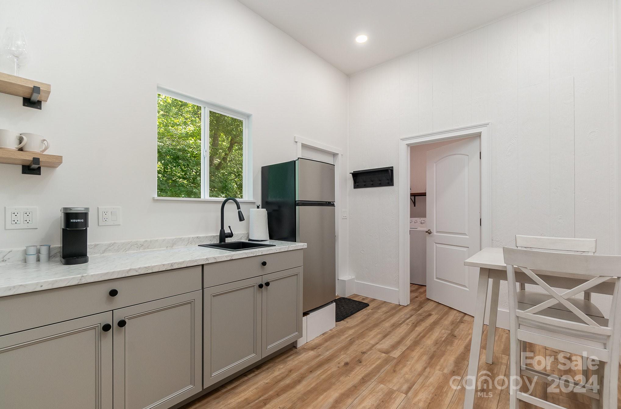 2070 Applebrook Drive Monroe, NC 28110 - Photo 20 of 35 a kitchen with a sink appliances and cabinets
